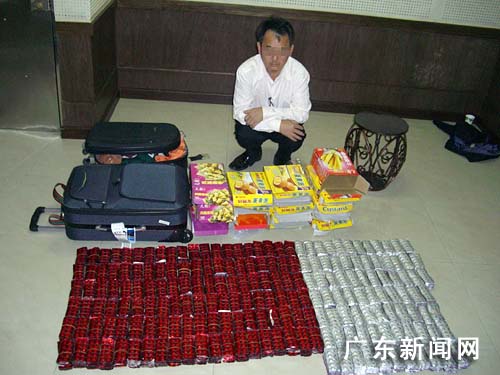 广州海关查获新型毒品红五近五万粒(图)
